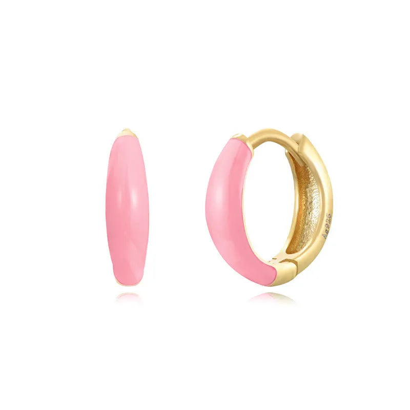 Geometric U-shaped epoxy earrings with a dripping oil finish in various colours.