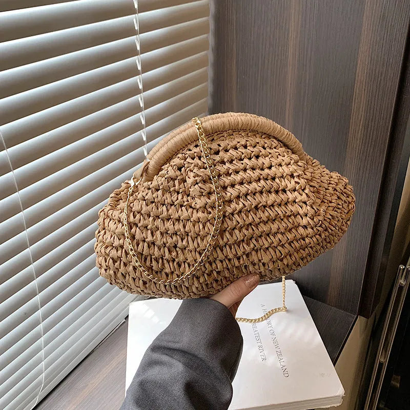 Shell-shaped straw shoulder bag for women with chain accents and polyester lining