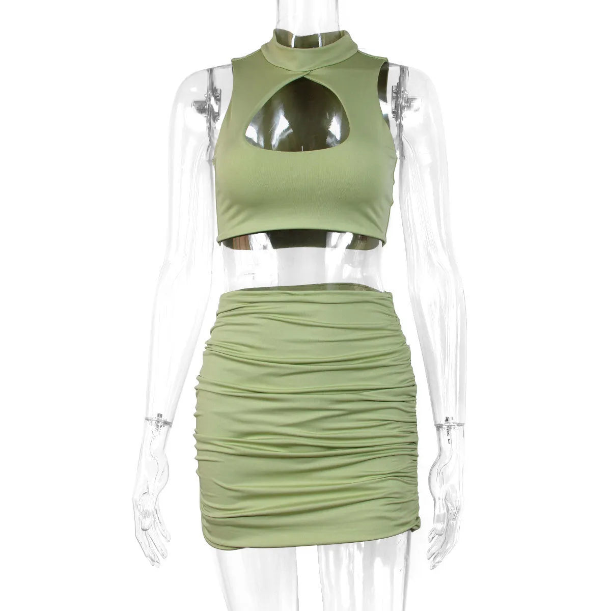 Light purple two-piece set with hollow vest top and split hip skirt on a model.
