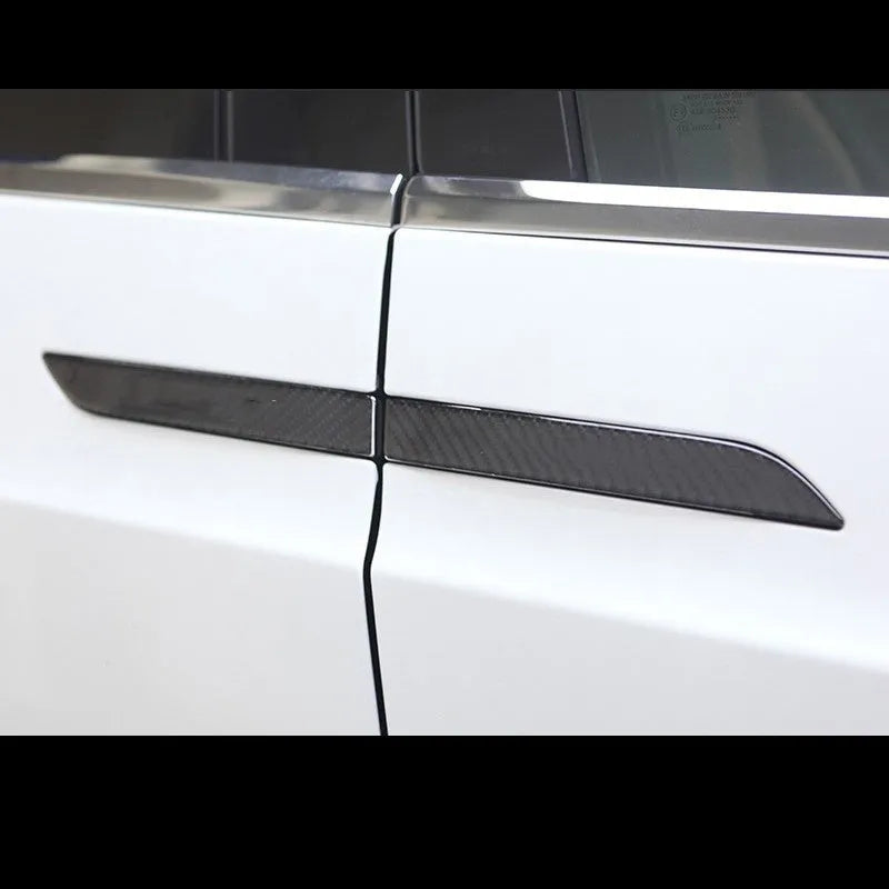 Carbon fibre door handle protective stickers for Tesla Model S, showing adhesive drip pattern.