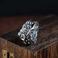 Silver open ring with detailed jibeast animal zodiac pattern and diamond details