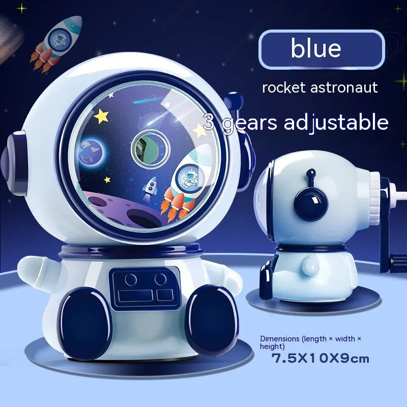 Blue astronaut-themed manual pencil sharpener with adjustable dial showing three sharpening levels