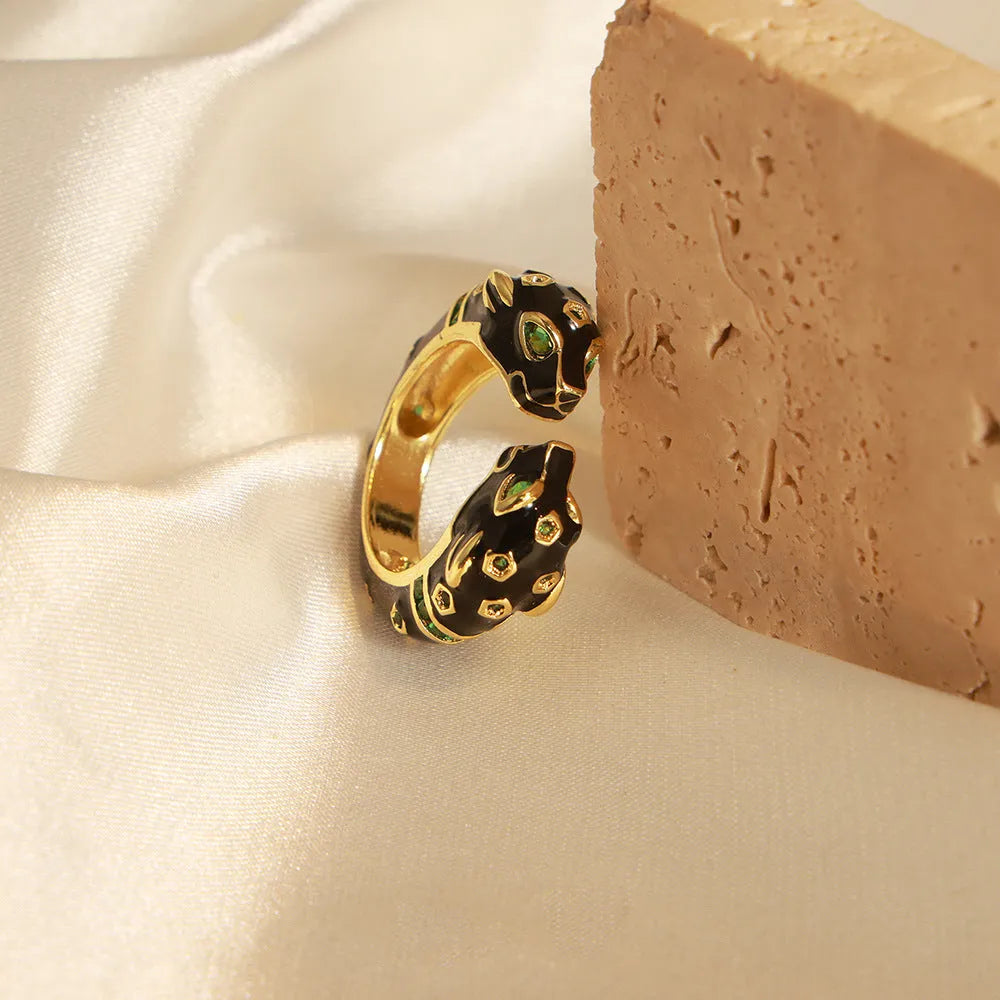 Black cheetah print geometric open ring for women in size 7, made from copper with electroplated finish
