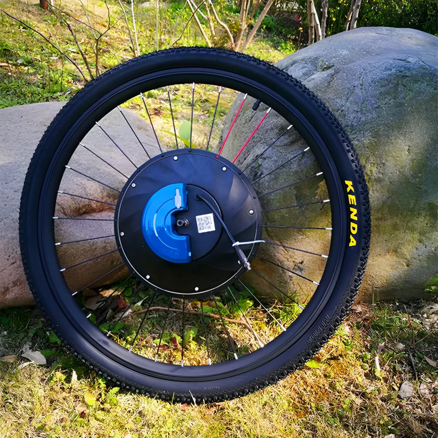 26-inch bicycle electric conversion kit showing hub motor wheel, lithium battery, and charger