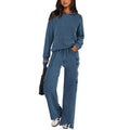 Women's polyester leisure sports suit set showing long sleeve top and matching trousers in multiple colour options