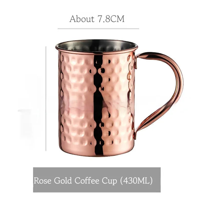 Copper plated stainless steel Moscow Mule mug in hammered and smooth styles, shown in silver, gold, rose gold, and black.