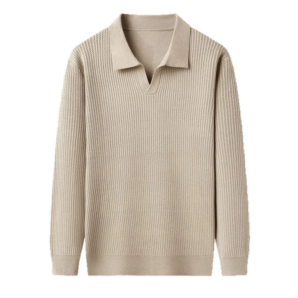 Men's loose green pullover sweater on a hanger, casual autumn wear.