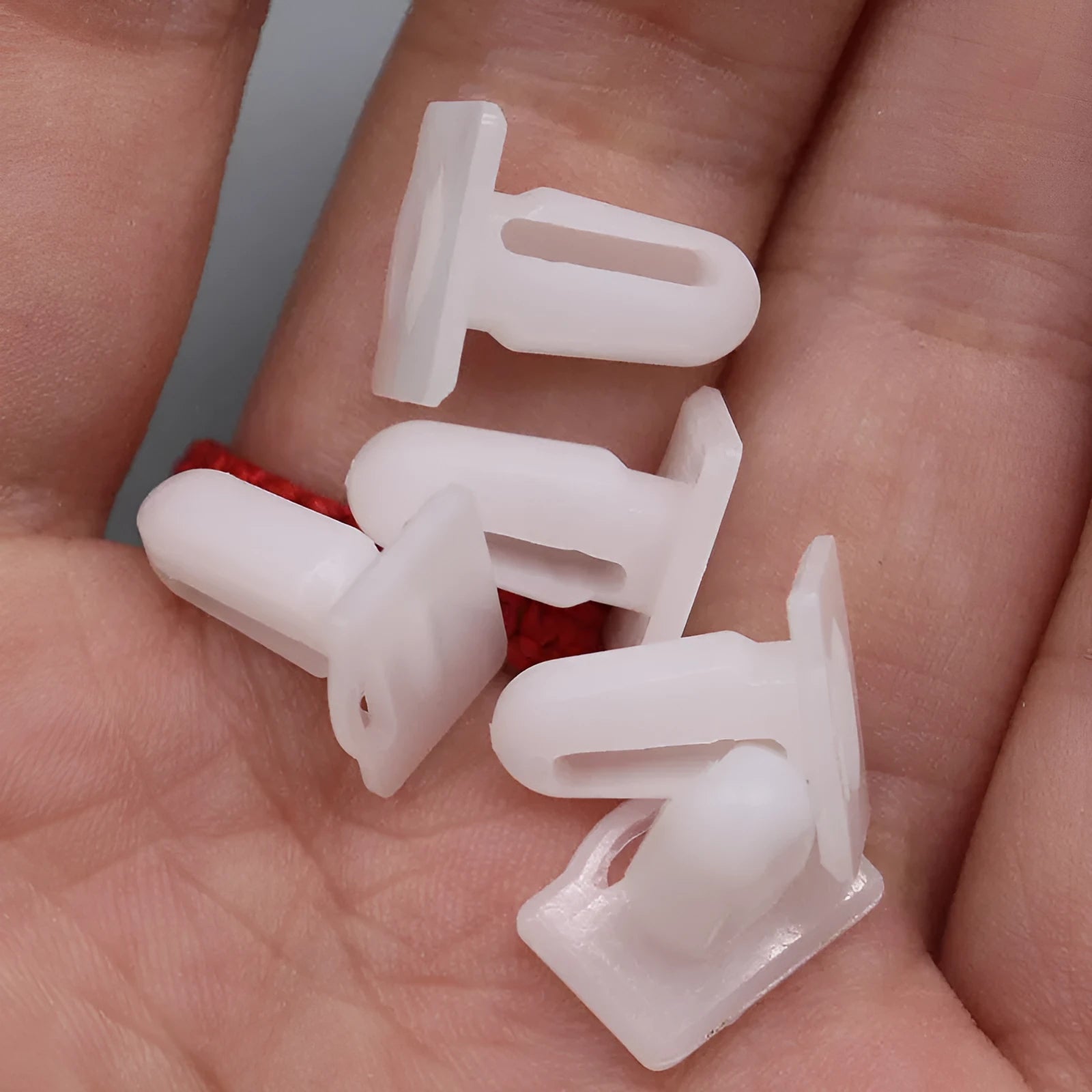 Pack of 60 grey PA66 plastic automotive push rivet clips for car trim fastening.