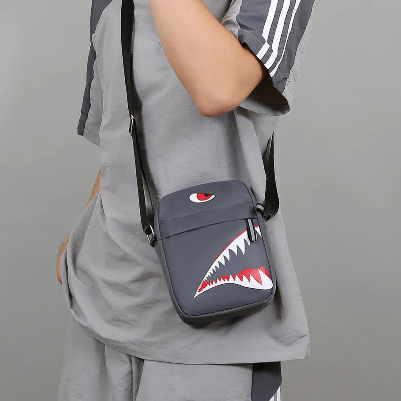 Men's small black crossbody bag with an animal pattern made from oxford cloth.