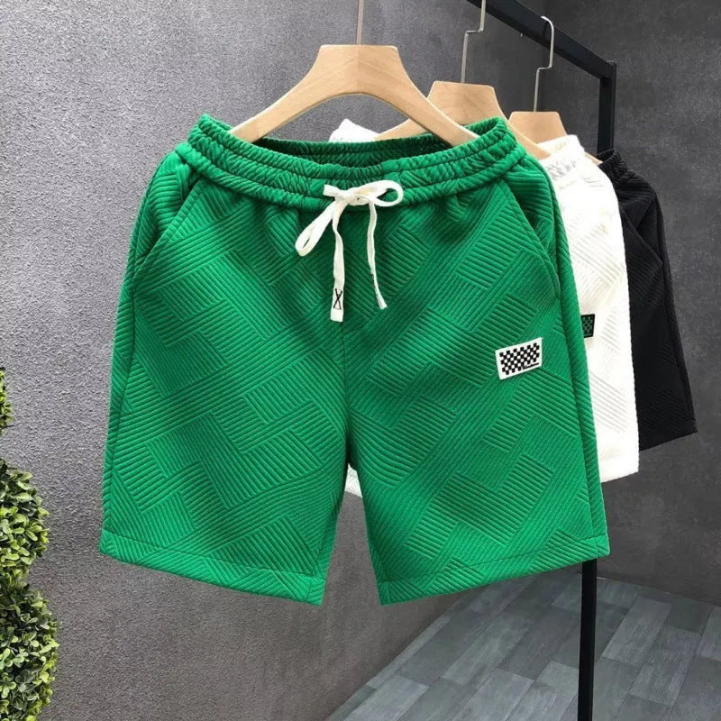 Men's casual sports shorts in black, green, or white with American style cut and micro-elastic polyester fabric