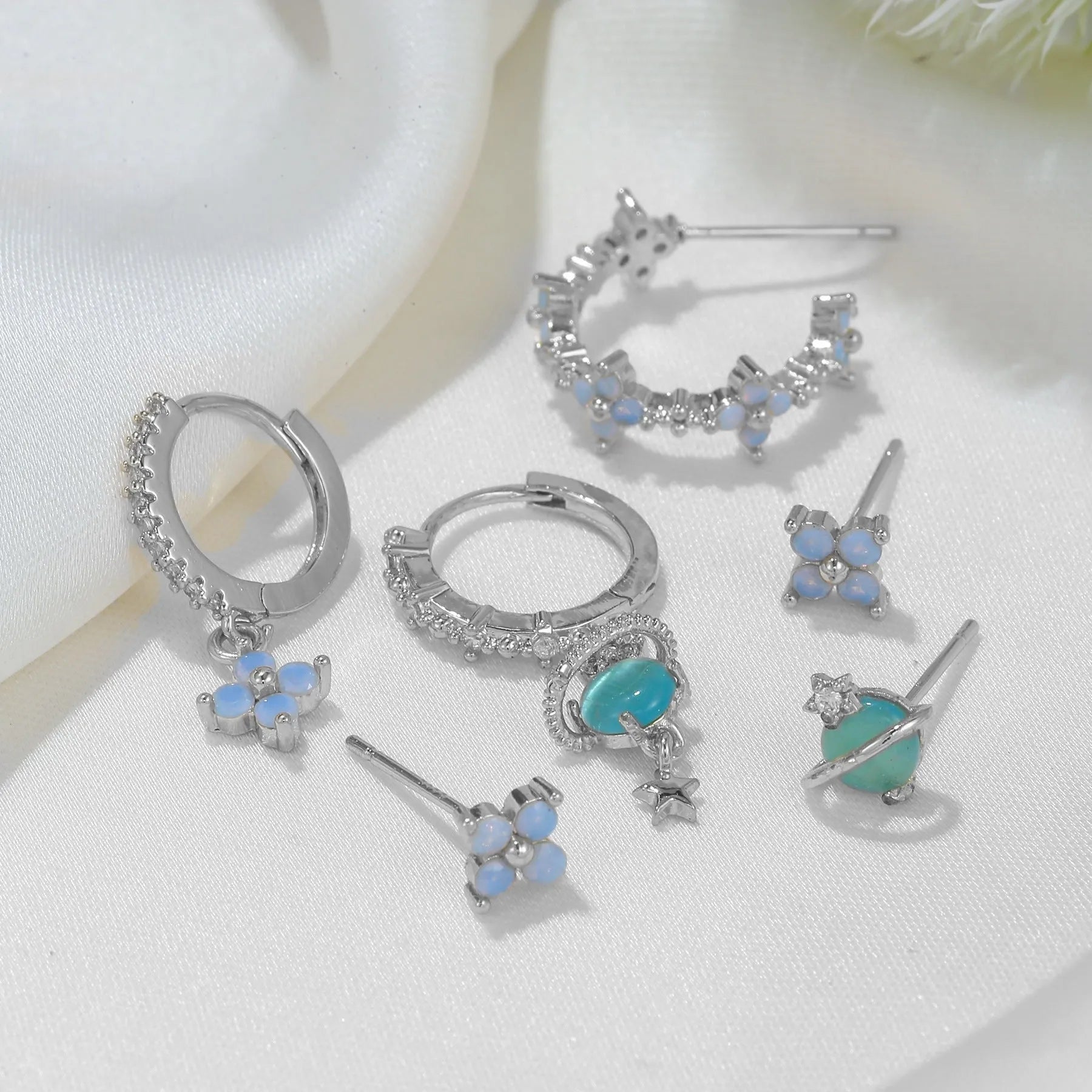 Gold and silver flower stud earrings with blue zircon mosaic accents in Japanese Korean style