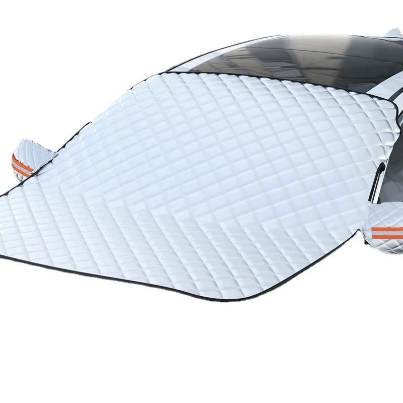 Large aluminium foil winter car cover for SUVs with reflective stripes and magnets.