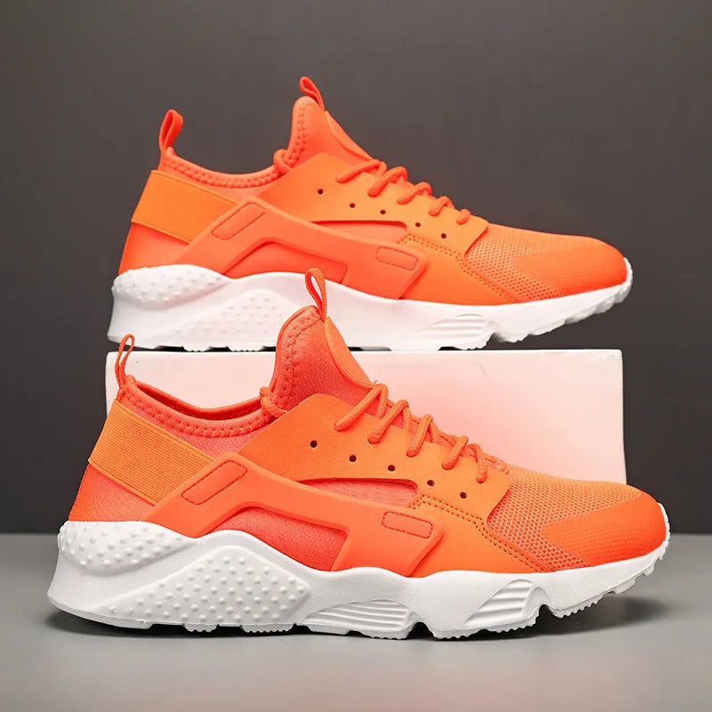 Men's low top casual shoes in fluorescent red with mesh upper, cross shoulder straps, and flat MD sole.