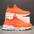 Men's low top casual shoes in fluorescent red with mesh upper, cross shoulder straps, and flat MD sole.