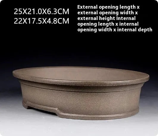 Handmade antique style oval purple sand ceramic bonsai pot, 25cm long by 21cm wide.