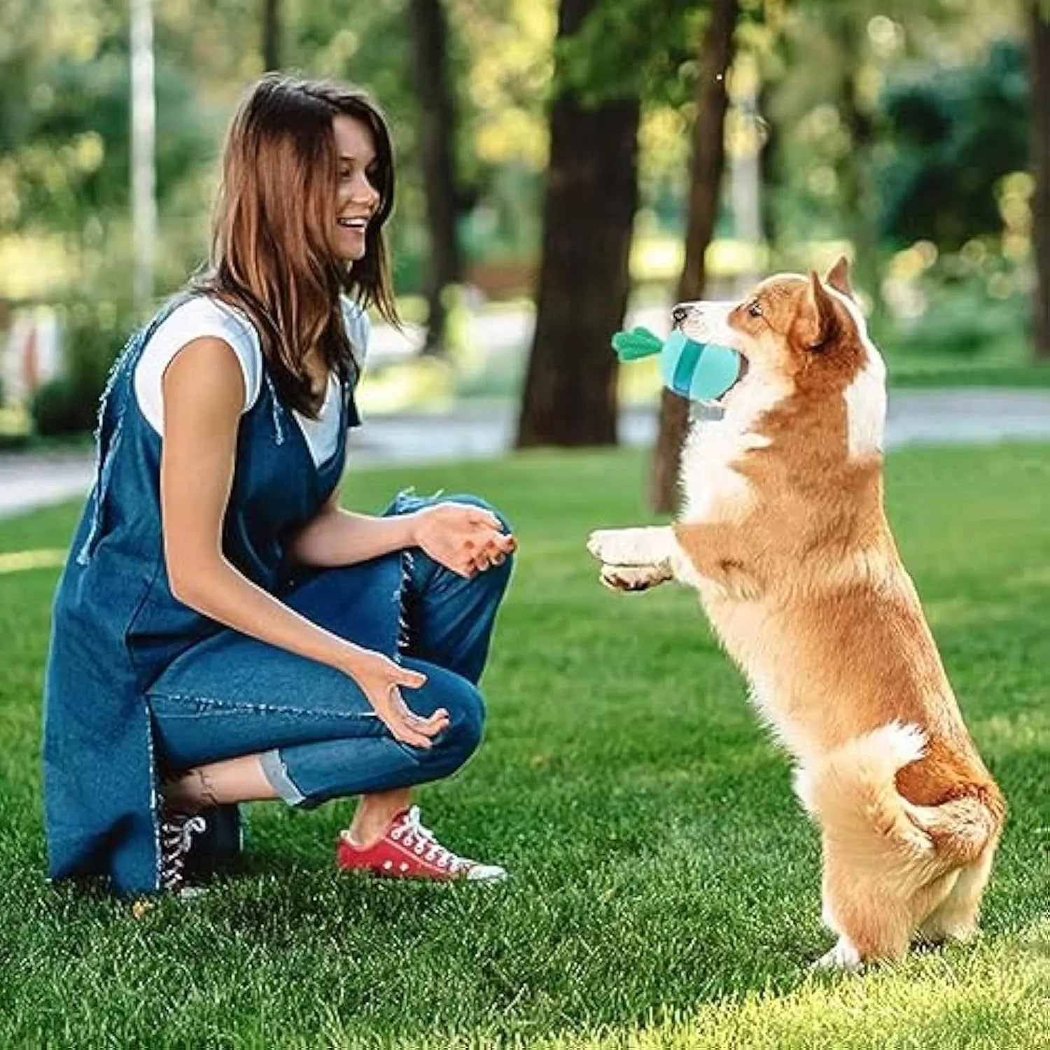 Blue interactive treat dispensing dog toy ball with durable rubber construction for medium large dogs