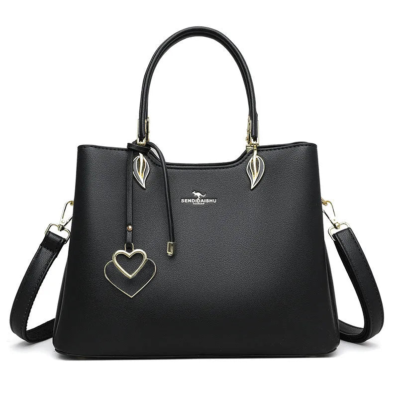 Women's black PU messenger bag with multi-layer compartments and sewing thread detailing
