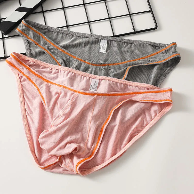 Men's ice silk modal underwear in dark grey showing knitted construction and hip support design