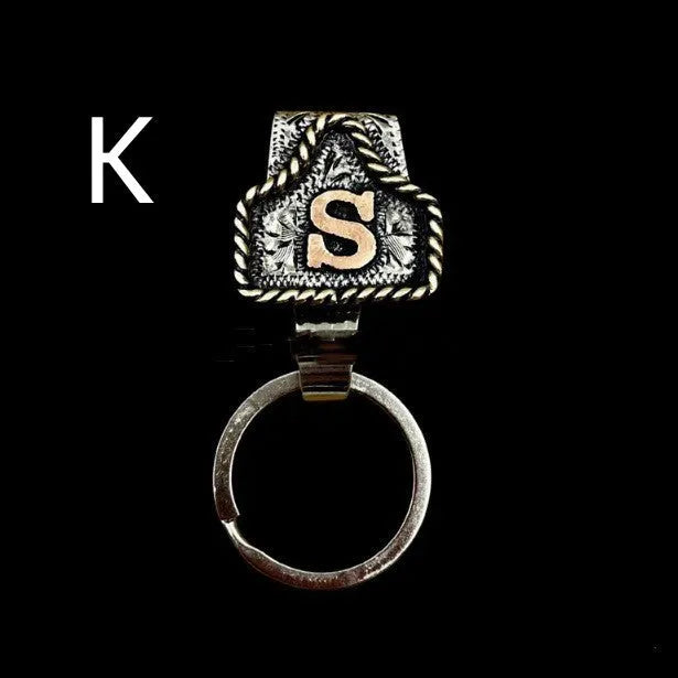 Handmade metal cow tag belt key holder with personalised alphabet letter