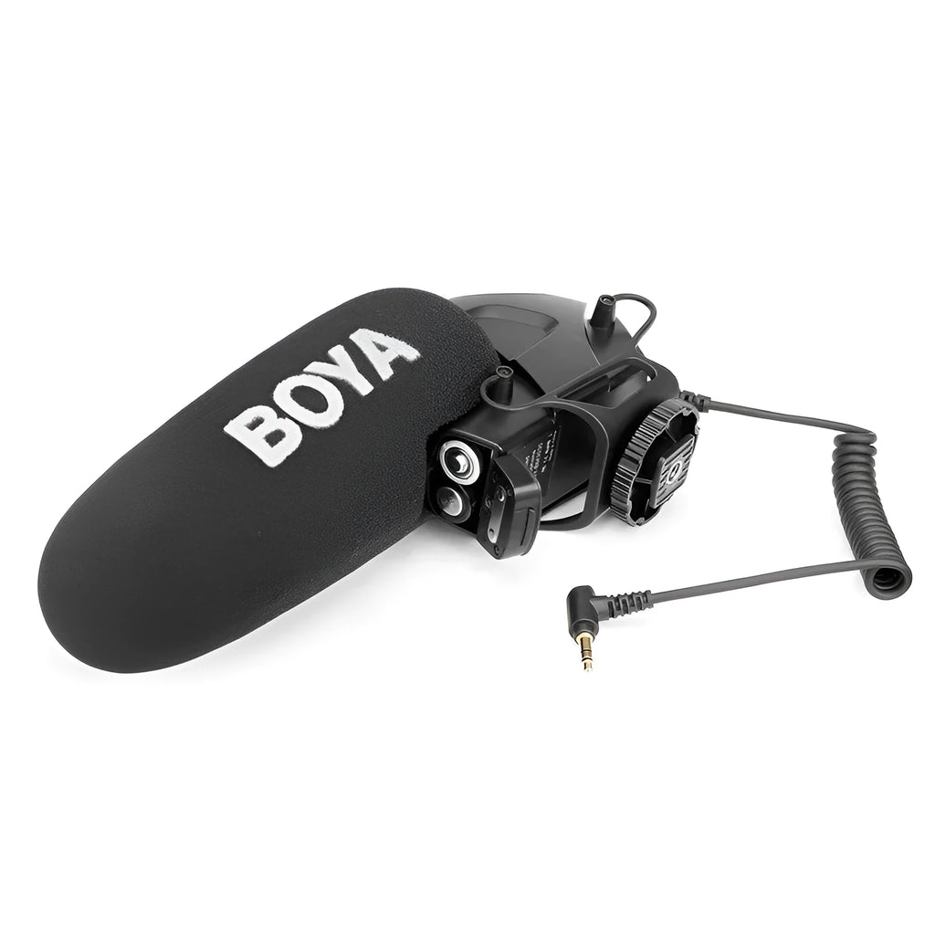 Set top super-heart directional wired microphone with metal grille on desk recording setup