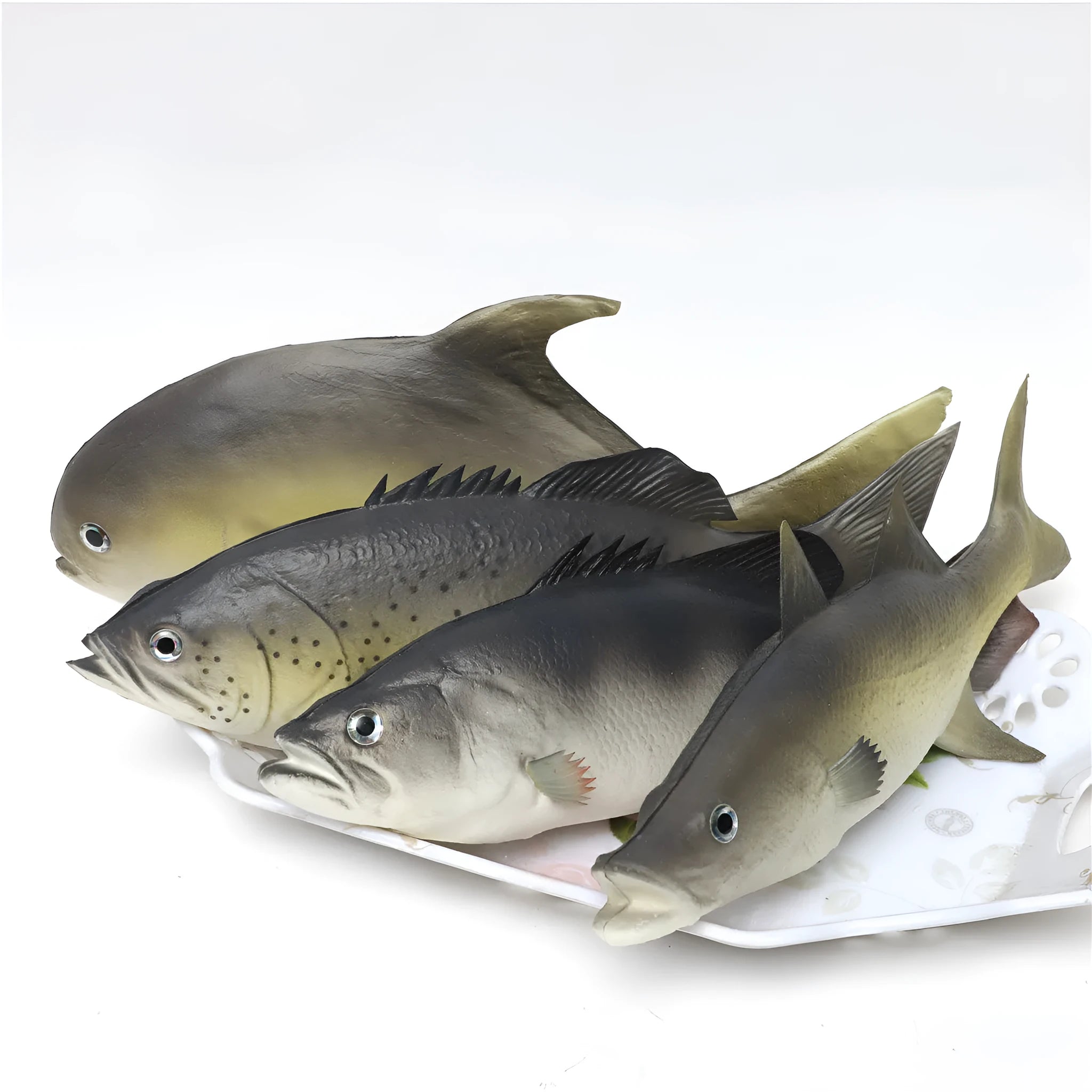 Three PU simulated fish models showing yellow-fin tuna variations on display surface