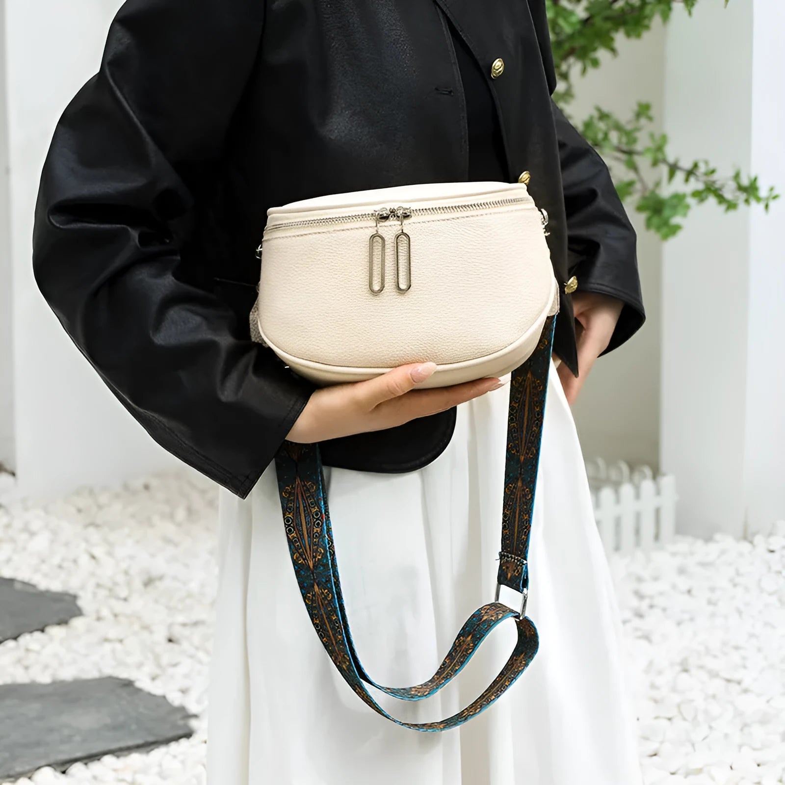 Women's soft PU leather messenger bag with saddle shape and crossbody strap in black, white or green colour options