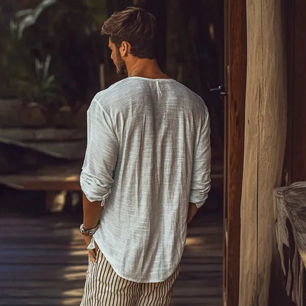 Beige slim fit long-sleeved V-neck top made from a hemp blend fabric.