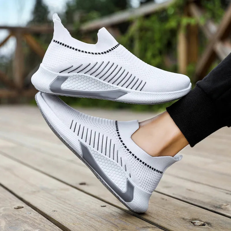 Men's low-top mesh sock sneakers with striped design and Flyknit upper.
