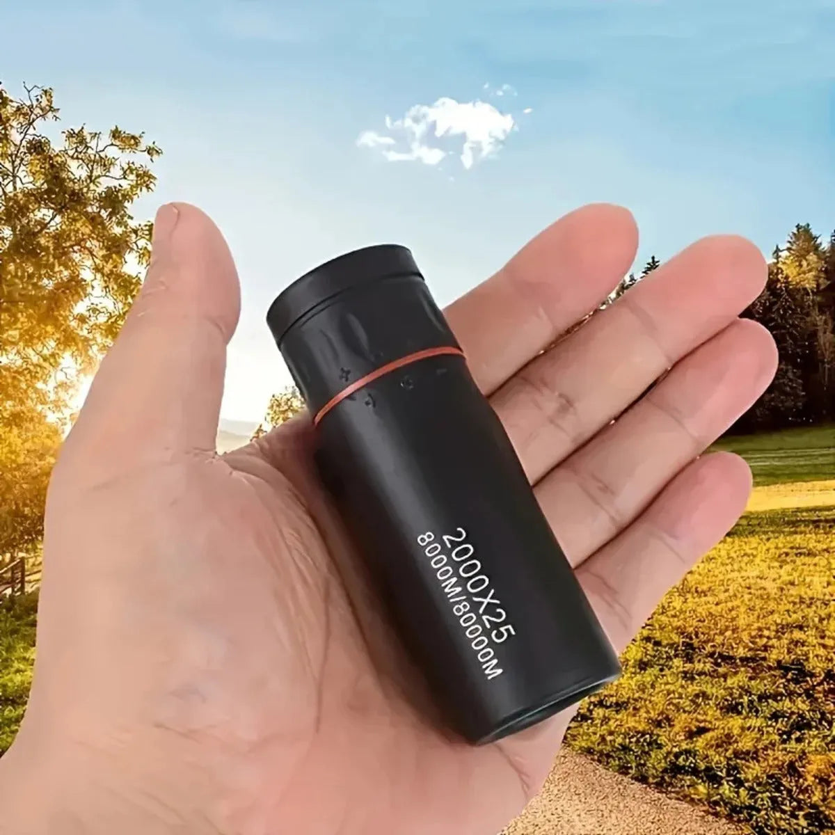 2000x25 HD monocular telescope with rubber exterior and holder on black background