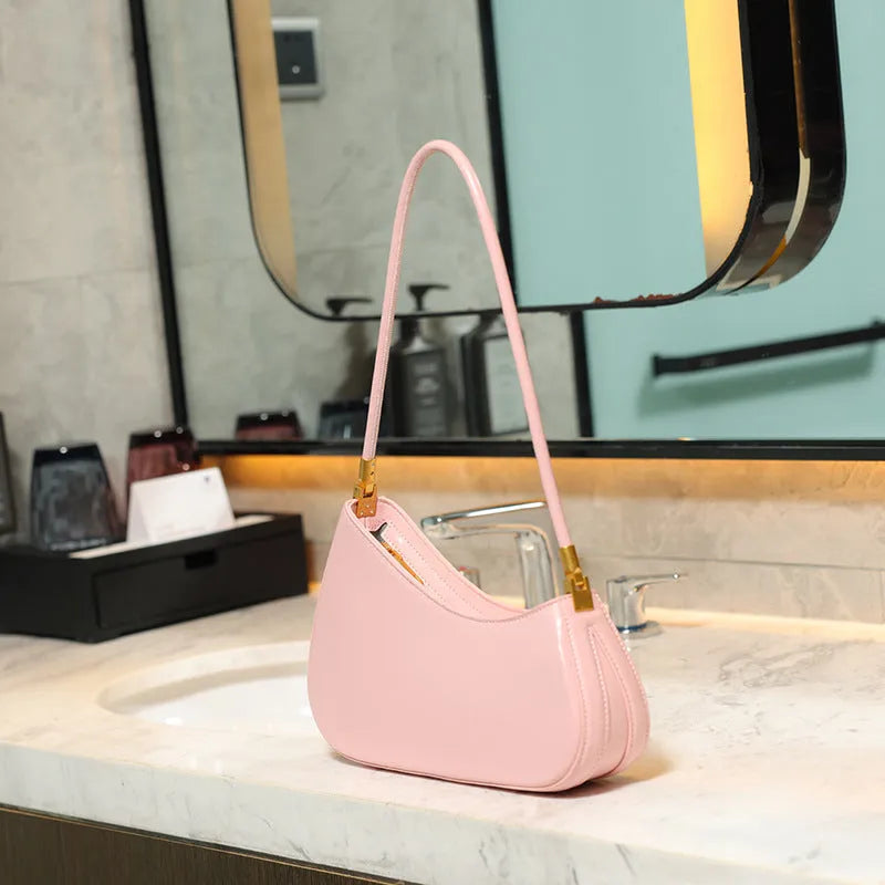 Women's oval retro underarm bag in PU leather with single strap and sewing line detailing