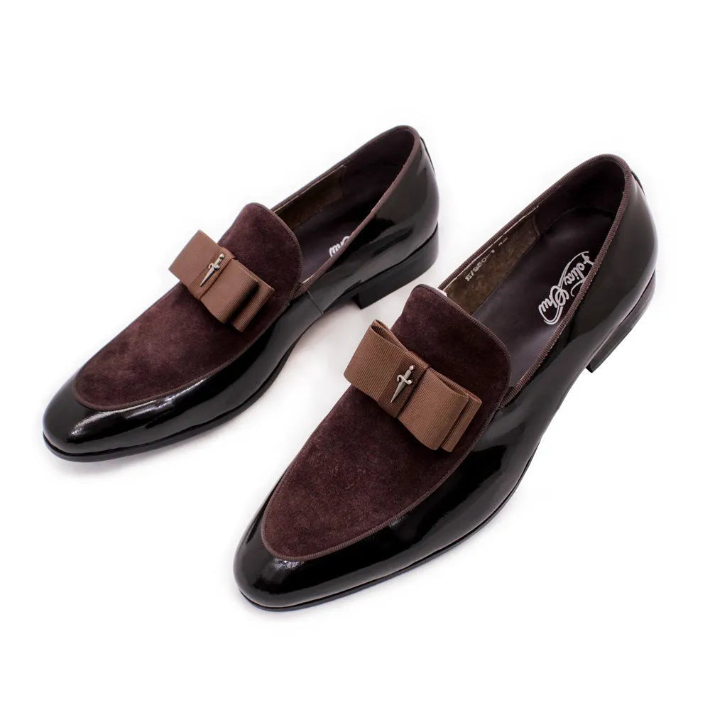 Men's black patent leather low-top dress shoes with a tassel detail on the front.