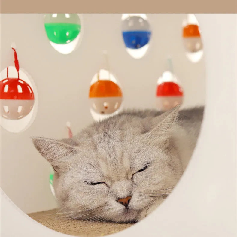Integrated cat scratch board with resting nest, play tunnel, and bell ball toy