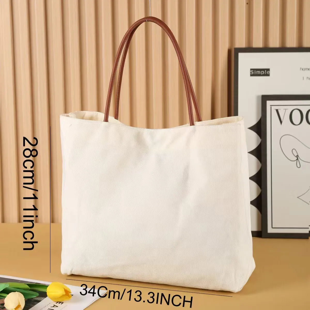 Heavy-duty natural canvas tote bag with long straps and reinforced bottom in beige white colour.