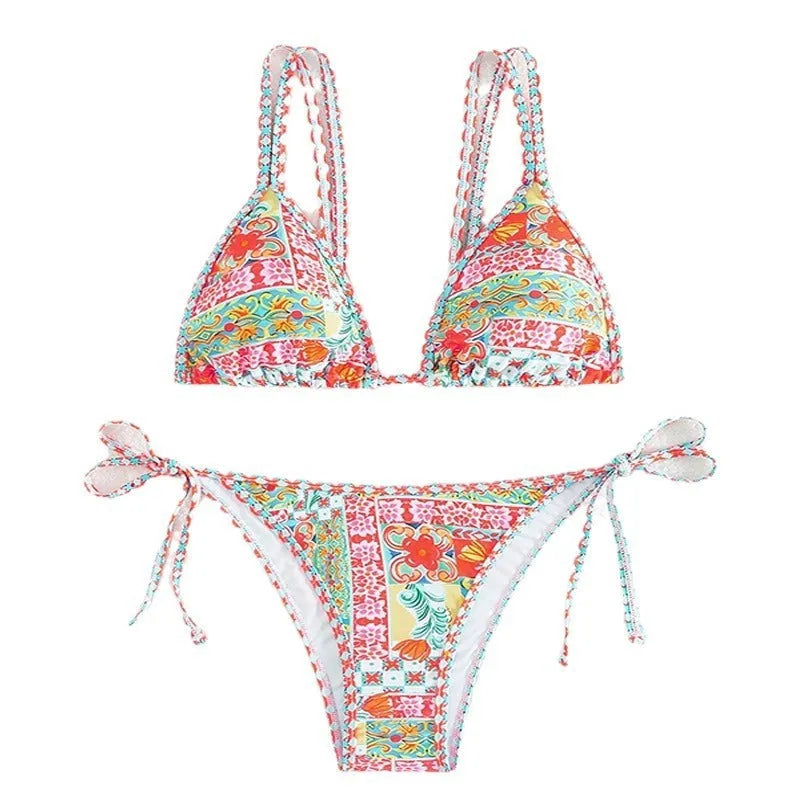 Women's lace-up split swimsuit in picture colour with a backless design and high-cut brief.