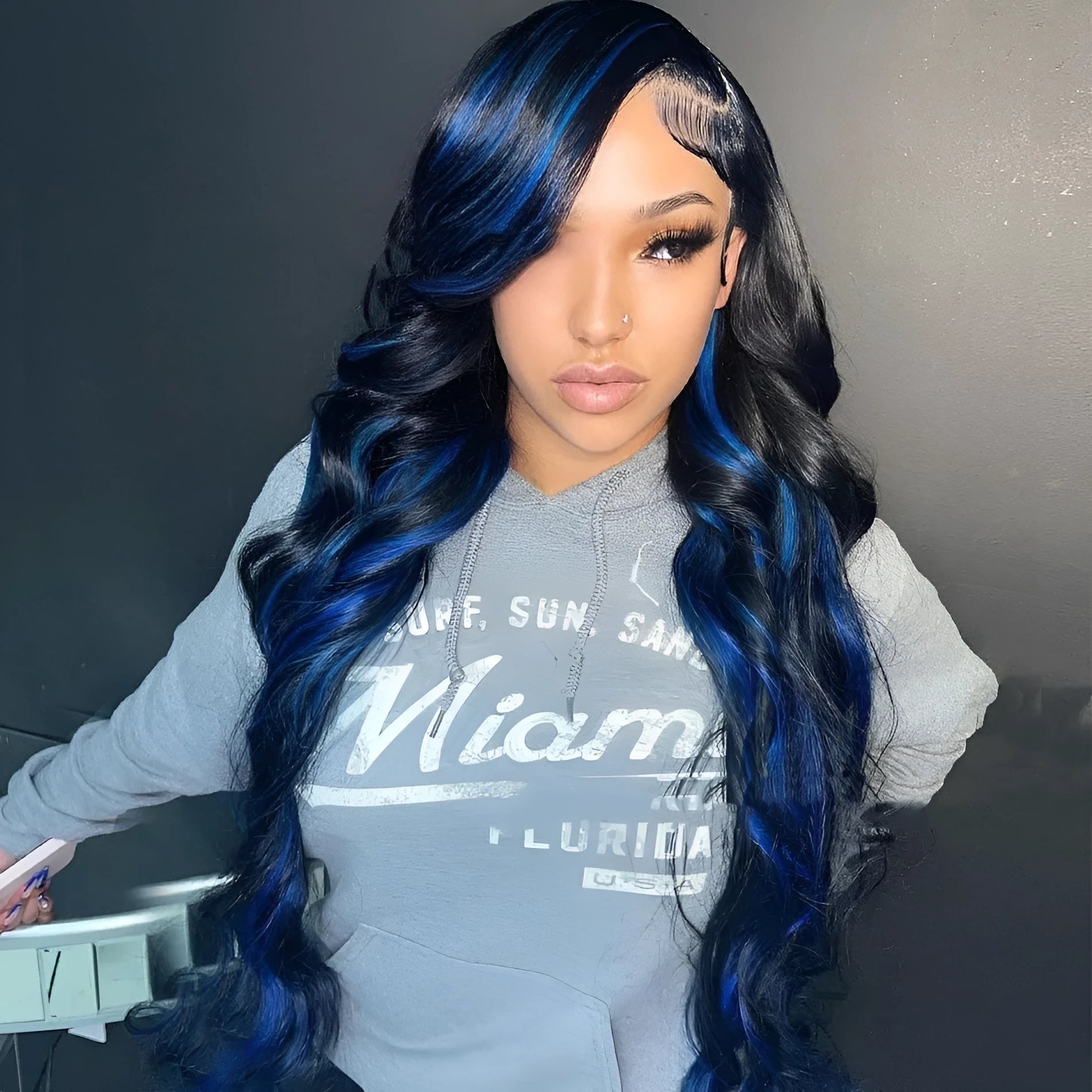 Real human hair lace front wig with 4x4 frontal on a model, demonstrating natural hairline and long hair.