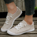 Women's creamy-white casual sneakers with fabric upper and rubber sole