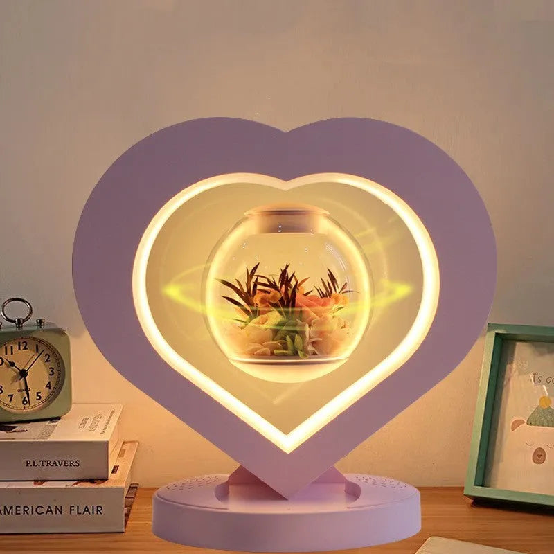 Pink preserved rose decorative ornament with optional base and Bluetooth speaker functionality.
