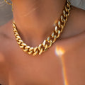 Women's gold-coloured thick chain necklace with 32cm length and 6cm pendant drop on alloy chain