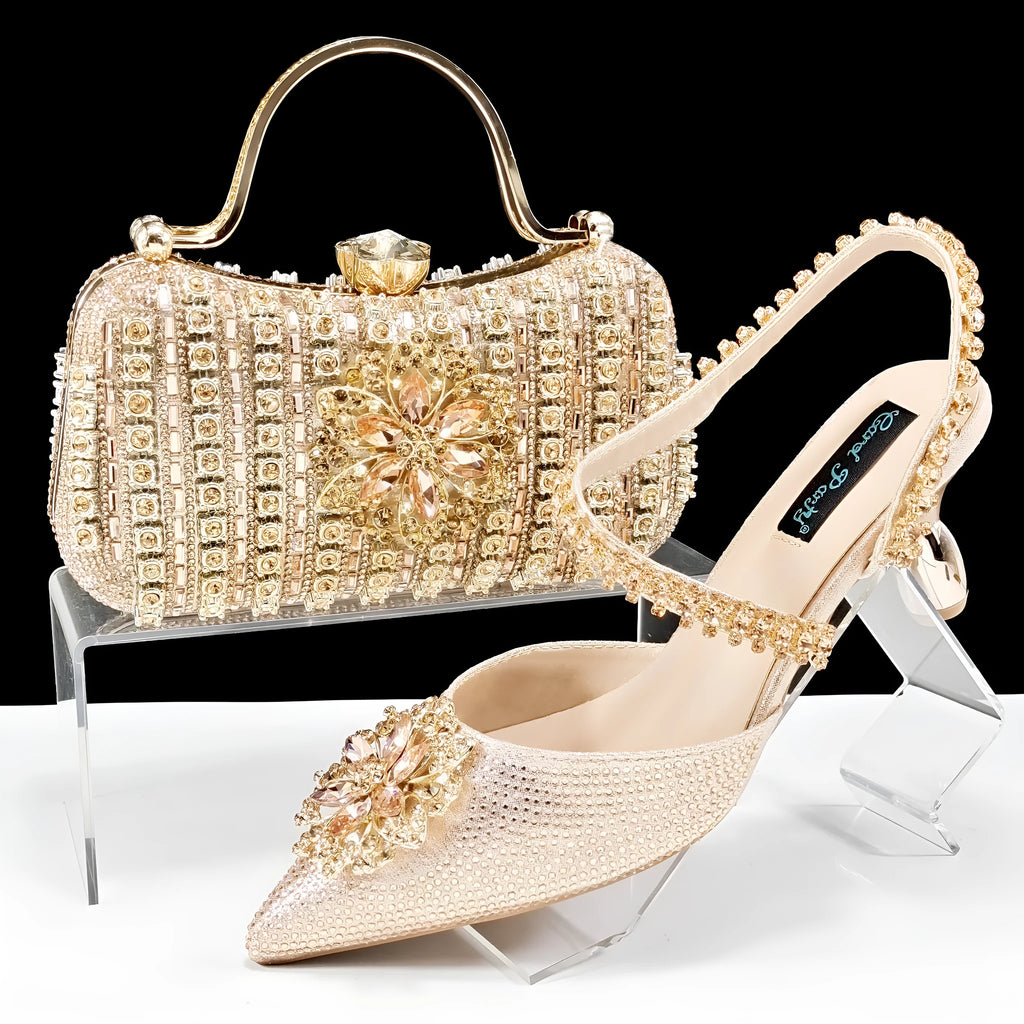 Women's black high heel shoes with matching clutch bag, decorative drill buckle flower ankle chain, and rhinestone details.