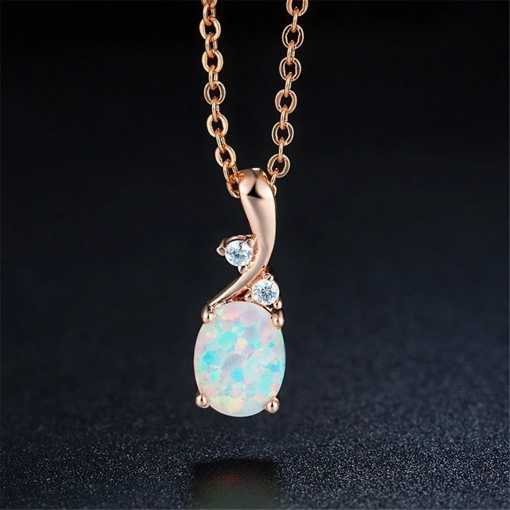 Water drop opal pendant necklace with adjustable chain in white or rose gold finish