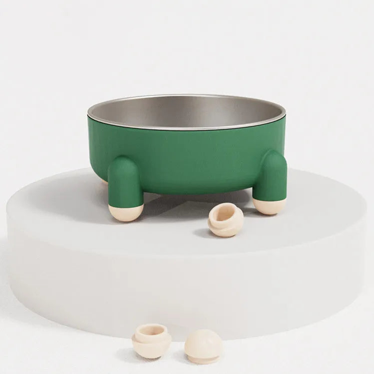 Green stainless steel pet bowl with non-slip base and high foot design on a wooden floor