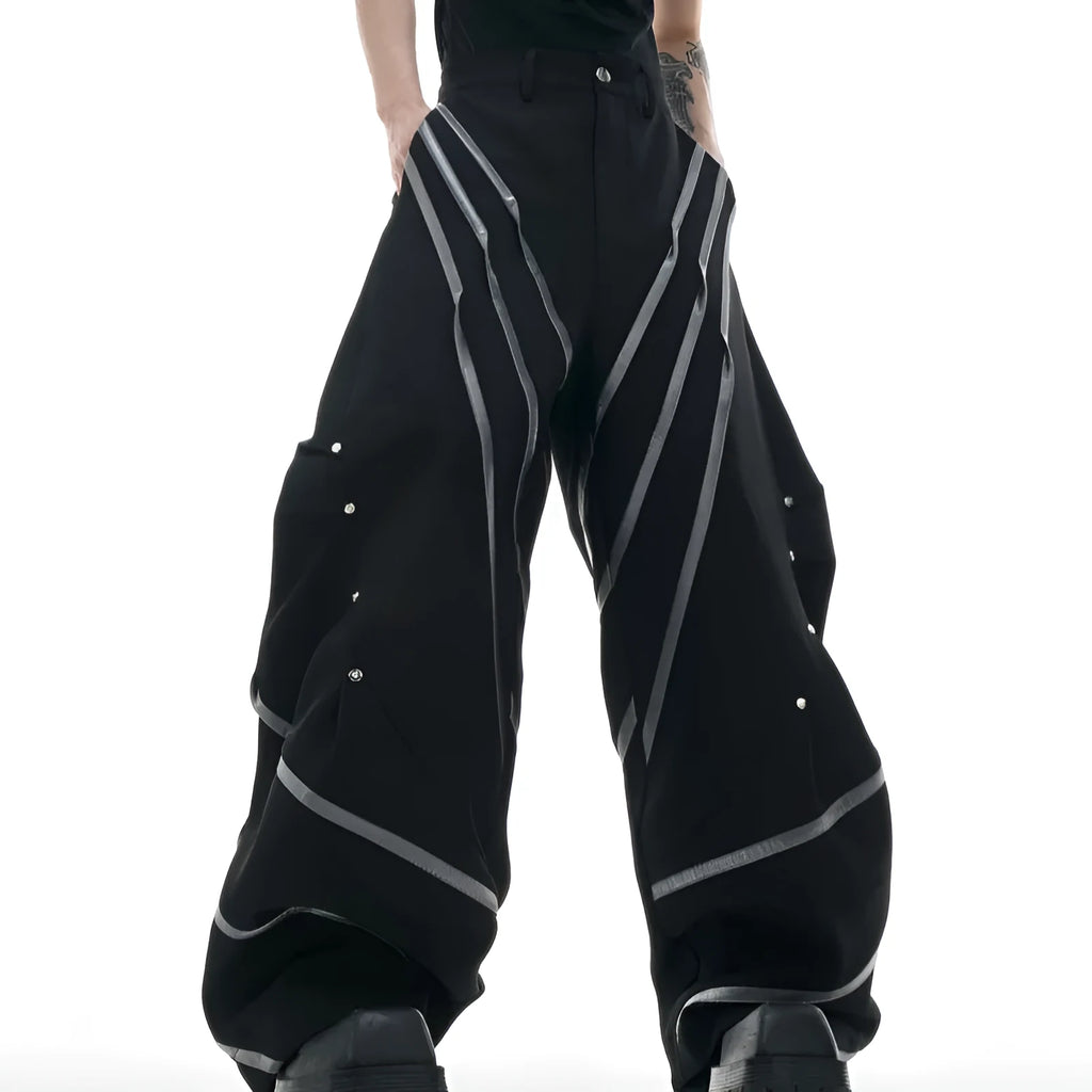 Men's black and white polyester trousers with three-dimensional cut and metal striped rivet pleats