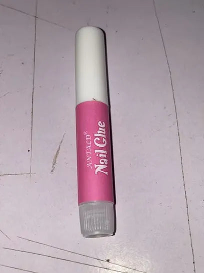 Small 2g tube of nail glue adhesive for press-on nails and nail art repairs