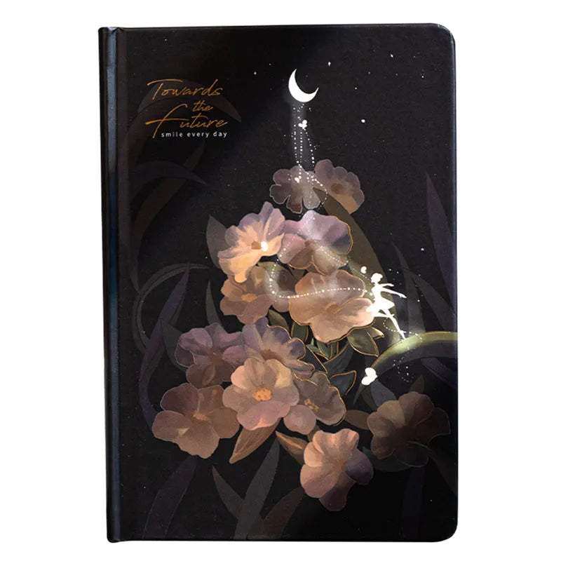A5 notebook with luminous purple cover open to show pages filled with colour illustrations.