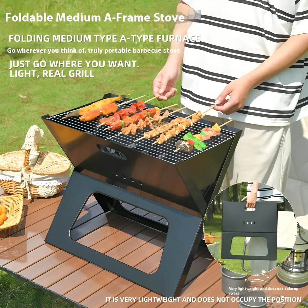 Black folding portable barbecue grill 44x29x37cm with carry handle outdoors