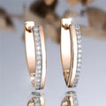 Women's V-shaped geometric ear clips in champagne gold with white diamond colour electroplated finish