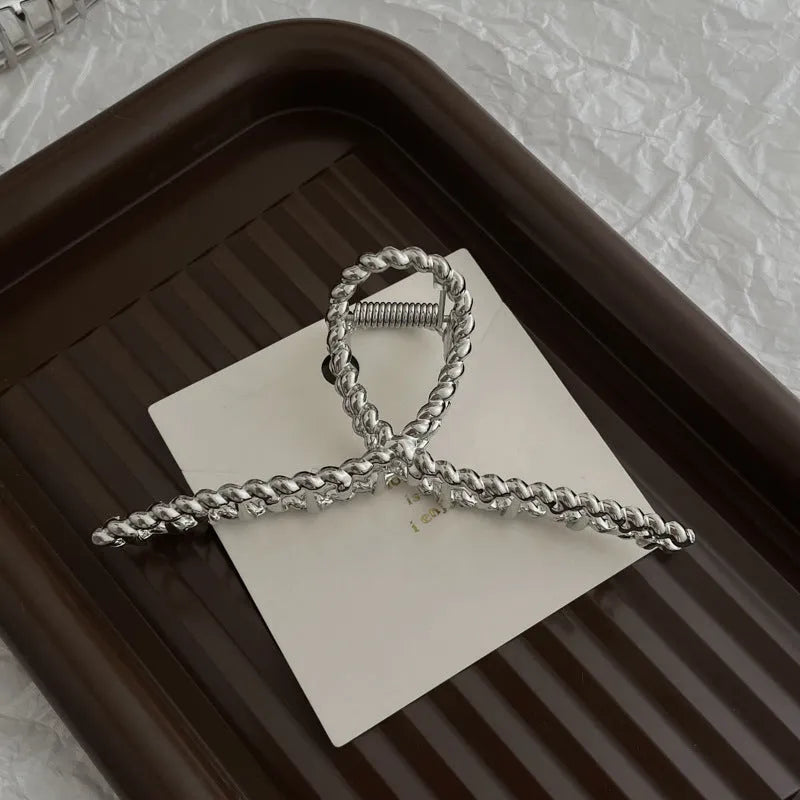 Silver metal hair barrette claw clip with electroplated finish and decorative design