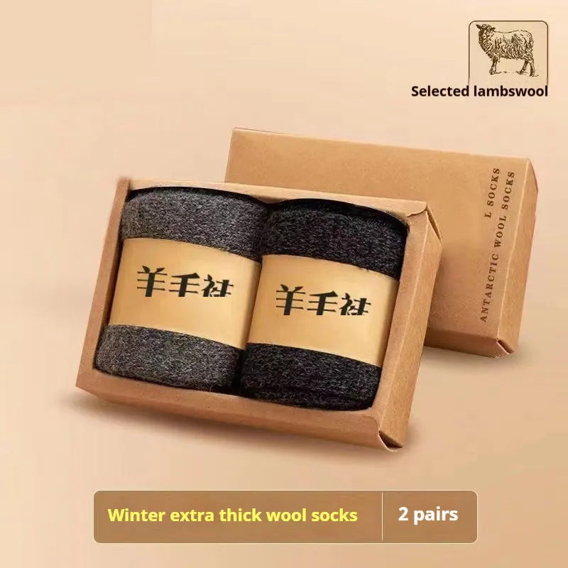 Pair of thick cotton winter socks in a solid colour, presented in a box.