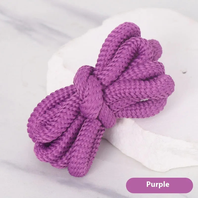 Oval elastic shoelace adapter ropes in various colours on a white background.