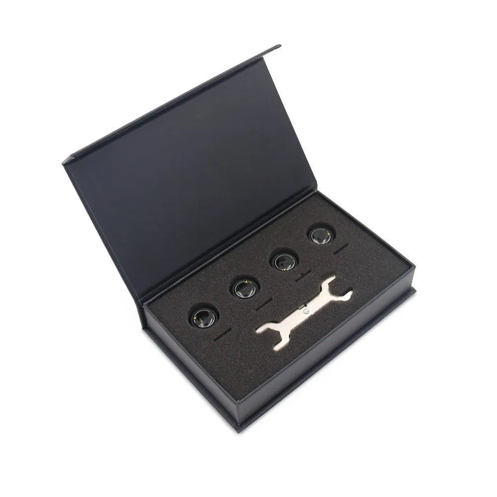 Bluetooth 5.0 tyre pressure monitoring system with four black external sensors, a wrench, and anti-theft screws.
